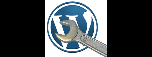 WordPress logo with metal wrench